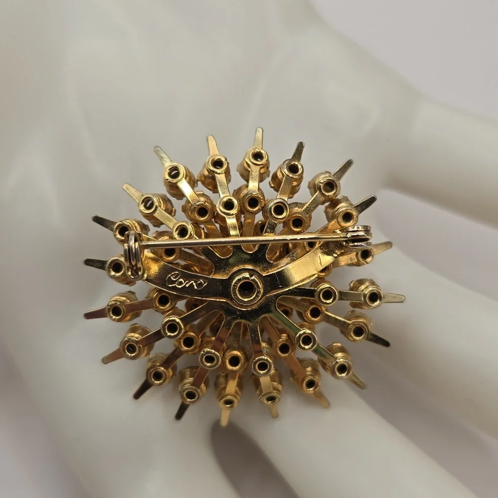 Vintage Coro Purple Rhinestone Starburst Gold Tone Brooch